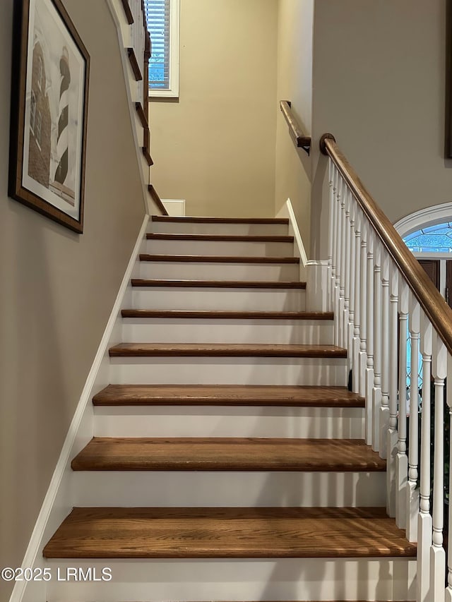 stairs featuring a wealth of natural light