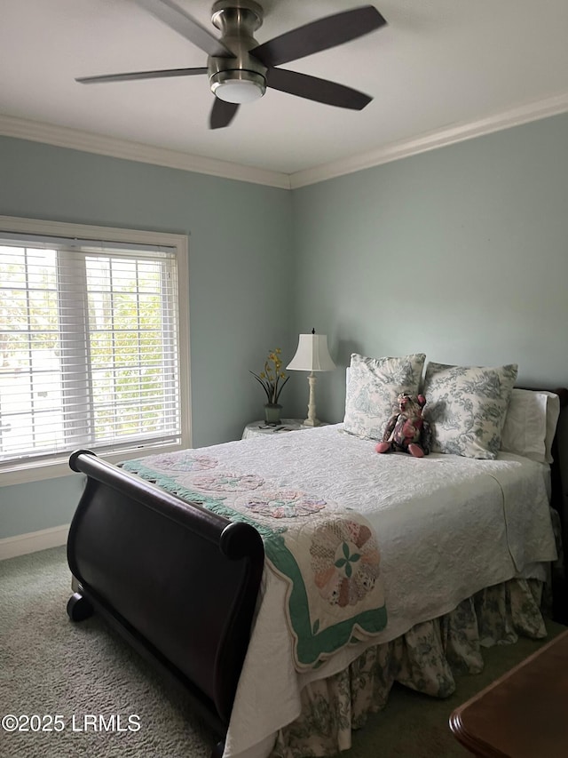 bedroom with baseboards, carpet, a ceiling fan, and crown molding