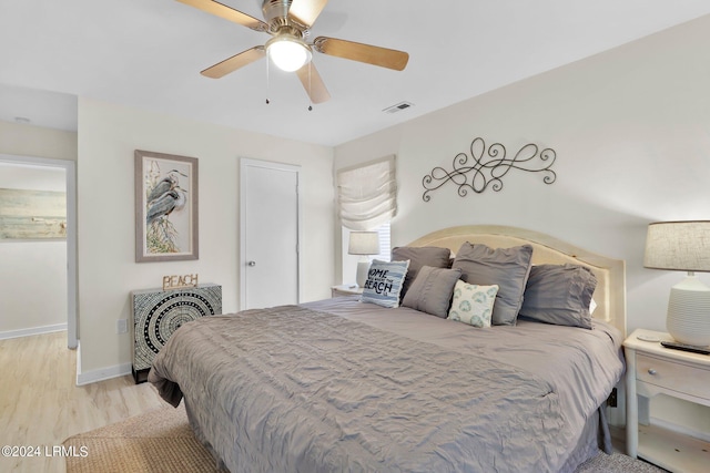 bedroom featuring ceiling fan and light hardwood / wood-style floors