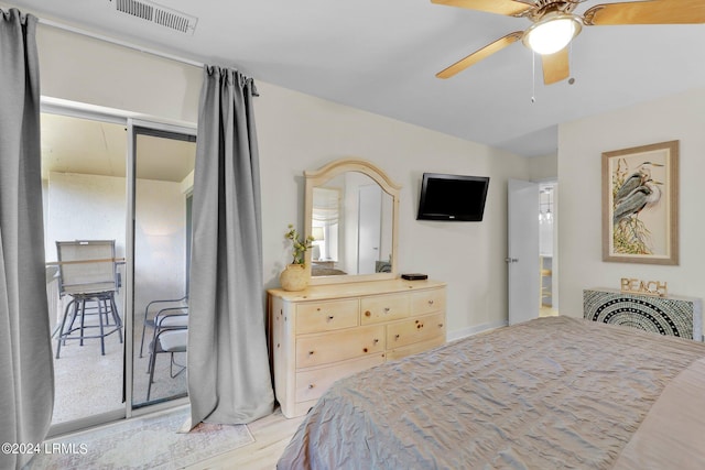 bedroom featuring light wood-type flooring and ceiling fan