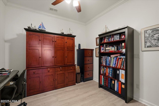 office area with crown molding, light hardwood / wood-style flooring, and ceiling fan