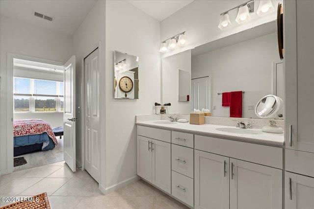 bathroom featuring vanity and tile patterned floors