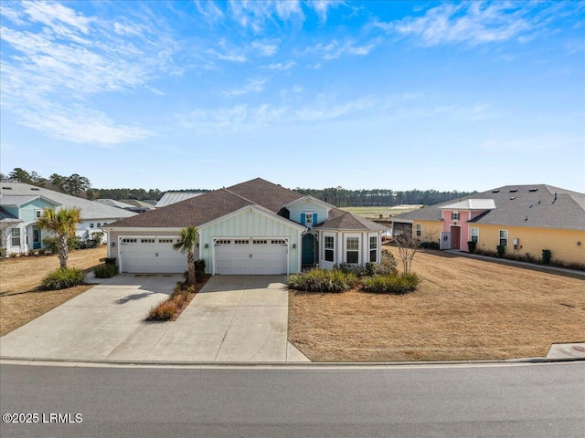 ranch-style home with a garage and a front yard