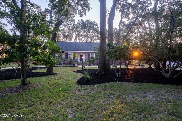 exterior space featuring a front lawn