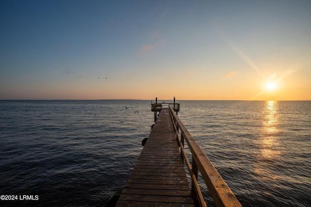 dock area featuring a water view