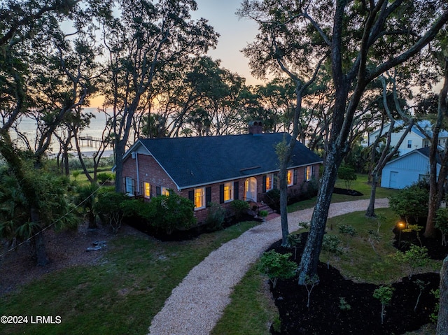 view of front of home featuring a yard