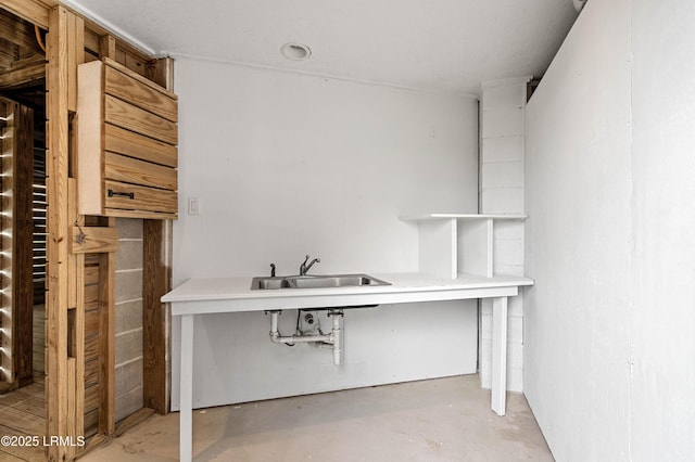 below grade area featuring a sink