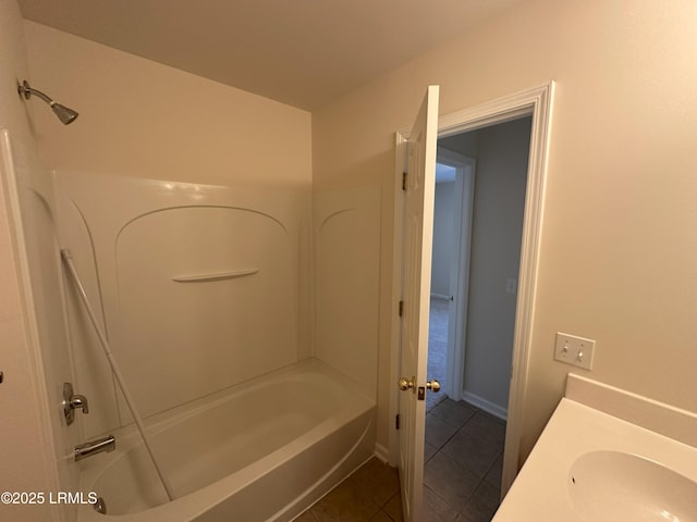 full bathroom featuring a sink, shower / tub combination, and tile patterned floors