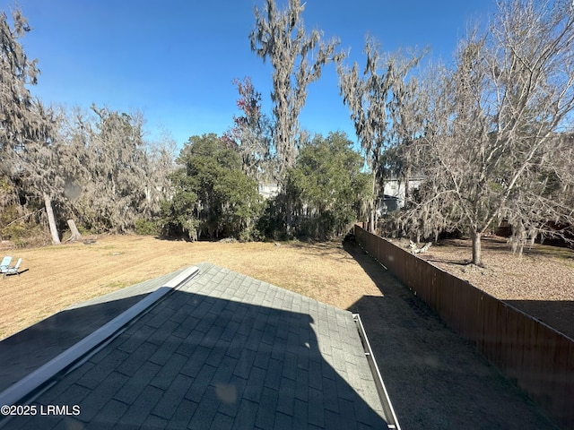 view of yard featuring a patio area and fence