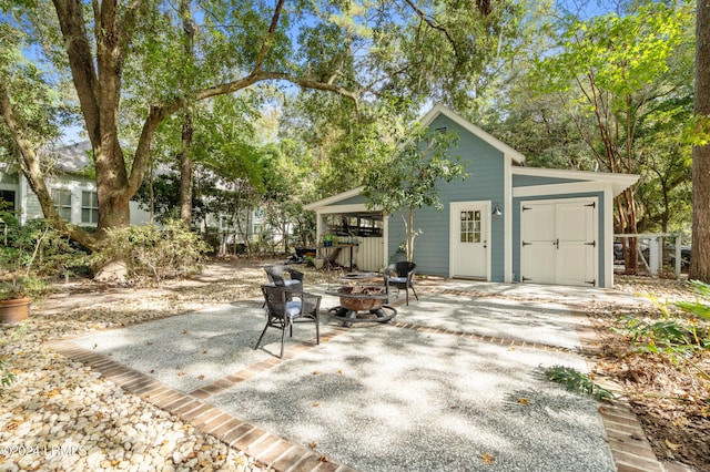 view of patio / terrace featuring a fire pit