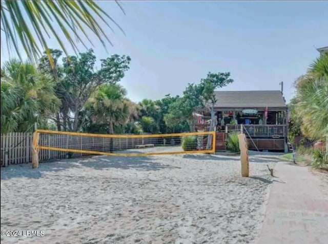 surrounding community featuring volleyball court