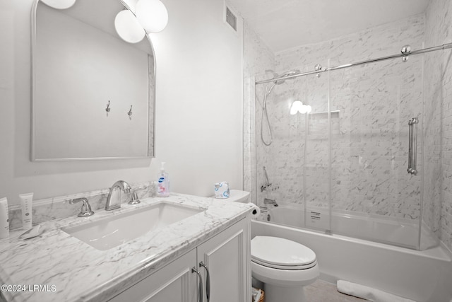 full bathroom with vanity, tub / shower combination, and toilet