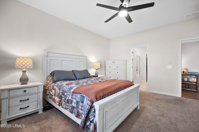 bedroom featuring ceiling fan, dark carpet, visible vents, and baseboards