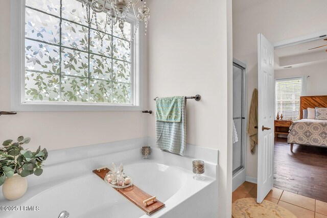 128 Colvin Dr, Okatie, SC 29909 - bathroom with a shower stall, tile patterned flooring, a bath, and connected bathroom