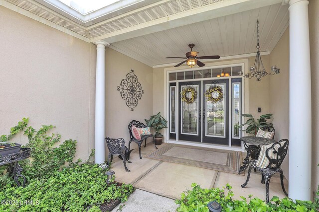 128 Colvin Dr, Okatie, SC 29909 - view of exterior entry with french doors and stucco siding