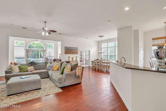 128 Colvin Dr, Okatie, SC 29909 - living area with visible vents, ceiling fan with notable chandelier, recessed lighting, and dark wood-style floors