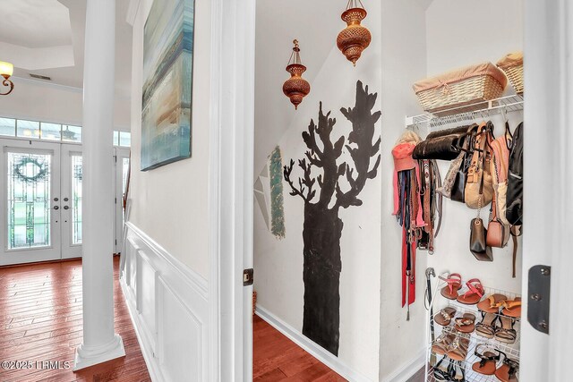 128 Colvin Dr, Okatie, SC 29909 - corridor with ornamental molding, visible vents, a wainscoted wall, wood finished floors, and baseboards
