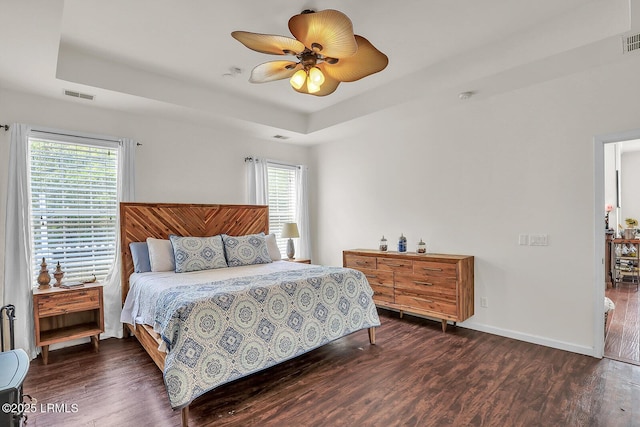 128 Colvin Dr, Okatie, SC 29909 - bedroom with a raised ceiling, wood finished floors, baseboards, and visible vents