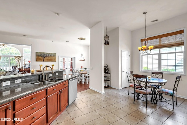 128 Colvin Dr, Okatie, SC 29909 - kitchen with stainless steel dishwasher, a notable chandelier, visible vents, and a sink