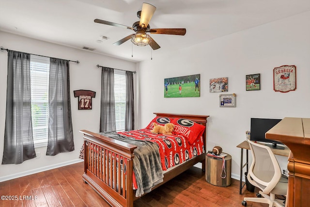 128 Colvin Dr, Okatie, SC 29909 - bedroom featuring visible vents, baseboards, a ceiling fan, and hardwood / wood-style floors