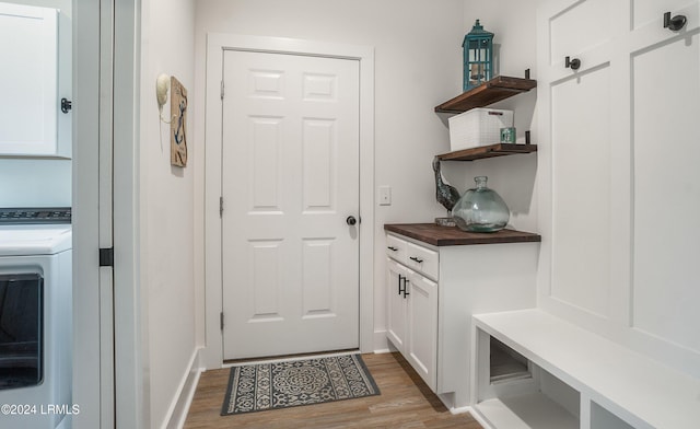 mudroom featuring washer / dryer and light wood-type flooring