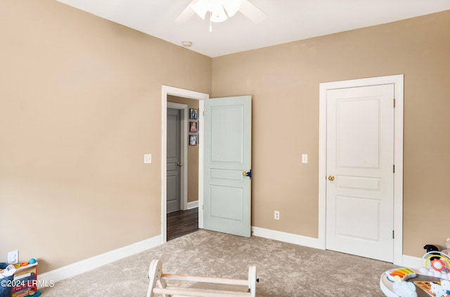 unfurnished bedroom with carpet flooring and ceiling fan