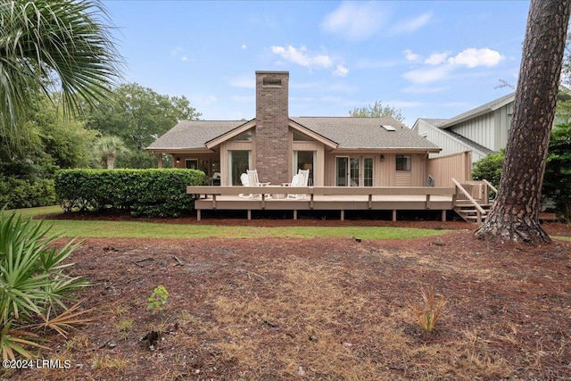 rear view of house with a deck