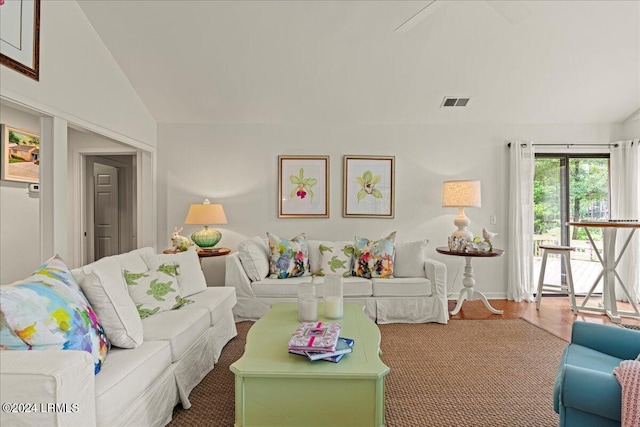 living room with vaulted ceiling