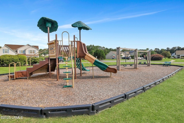 view of playground featuring a lawn