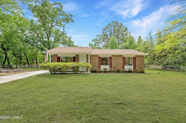 5618 Pulaski Ct, Beaufort, SC 29906 - single story home featuring brick siding, fence, a front lawn, and driveway