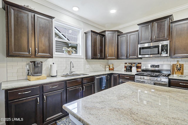 296 Hulston Landing Rd, Bluffton, SC 29909 - kitchen featuring appliances with stainless steel finishes, dark brown cabinetry, light stone countertops, ornamental molding, and recessed lighting
