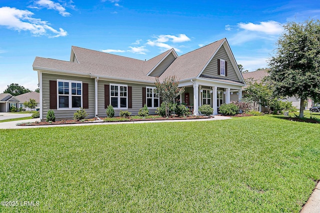 296 Hulston Landing Rd, Bluffton, SC 29909 - view of front facade with a front lawn and roof with shingles