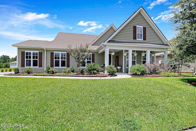 296 Hulston Landing Rd, Bluffton, SC 29909 - view of front of property featuring a front yard, a porch, and a shingled roof