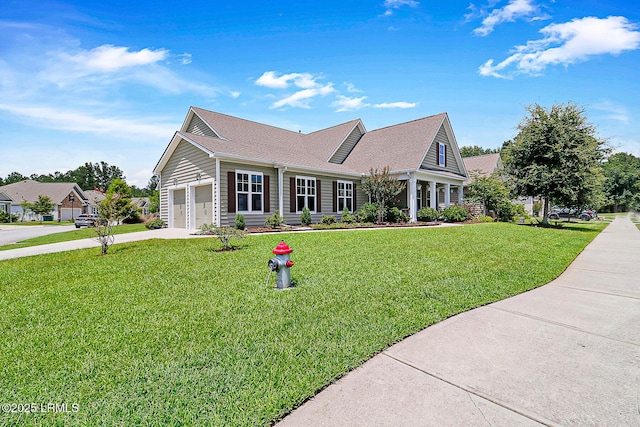 296 Hulston Landing Rd, Bluffton, SC 29909 - view of front of home with driveway, a front lawn, a garage, and a shingled roof