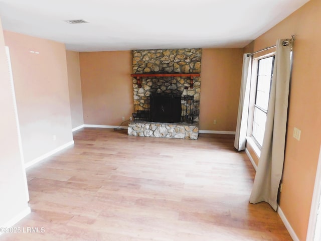 4348 Pinewood Cir, Beaufort, SC 29906 - unfurnished living room featuring a fireplace and hardwood / wood-style floors
