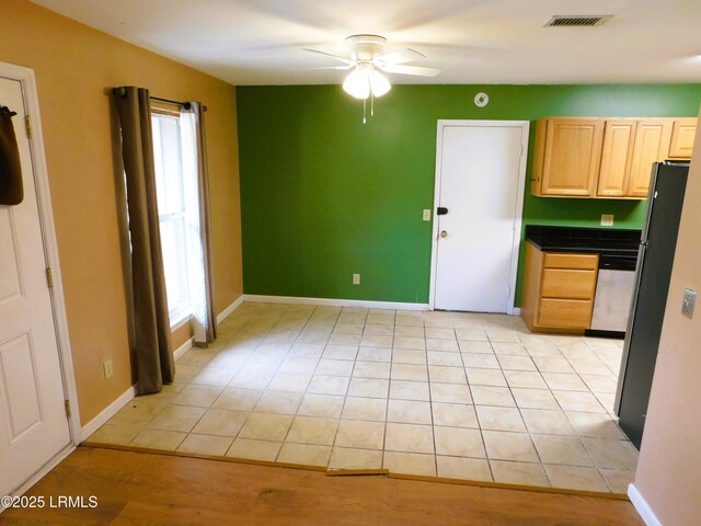 4348 Pinewood Cir, Beaufort, SC 29906 - kitchen with light brown cabinets, light tile patterned flooring, ceiling fan, and dishwasher