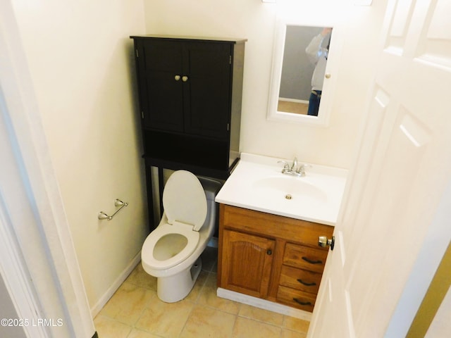 4348 Pinewood Cir, Beaufort, SC 29906 - bathroom with toilet, vanity, and tile patterned flooring