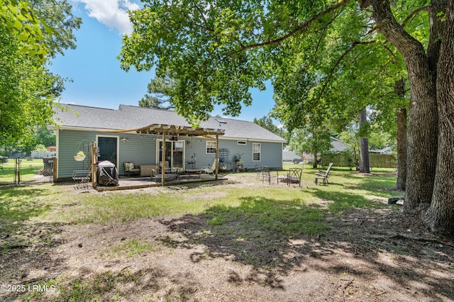 6 Wegeon Ln, Beaufort, SC 29906 - rear view of property with a gate, a pergola, an outdoor fire pit, a patio, and roof with shingles