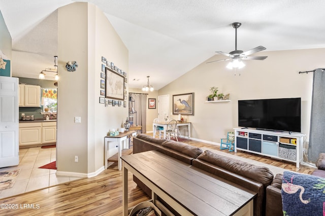 6 Wegeon Ln, Beaufort, SC 29906 - living area with lofted ceiling, ceiling fan, light wood-style floors, and a chandelier