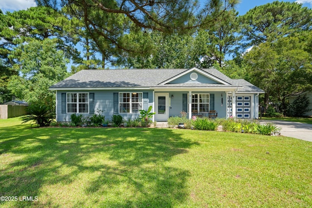 6 Wegeon Ln, Beaufort, SC 29906 - ranch-style house with an attached garage, a porch, driveway, and roof with shingles
