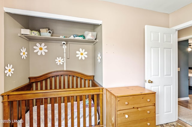 6 Wegeon Ln, Beaufort, SC 29906 - bedroom with a nursery area and wood finished floors