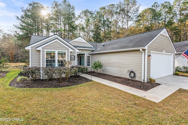 single story home featuring a garage and a front lawn