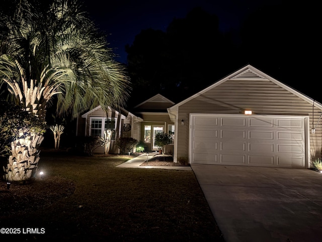 single story home featuring a garage