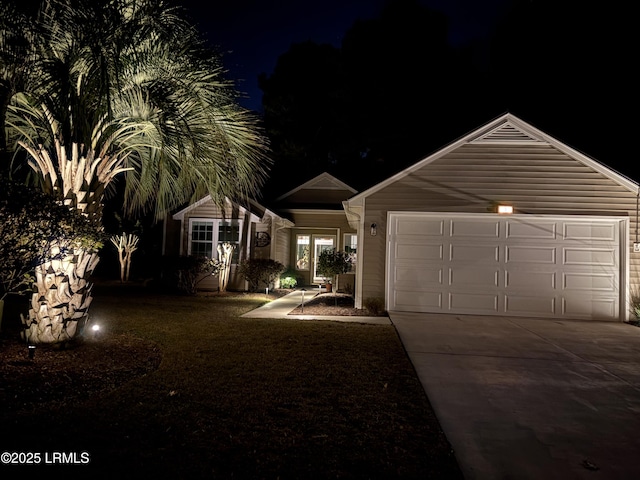 single story home featuring a garage