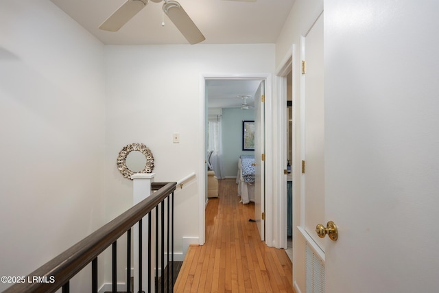 4 Marsh Harbor Dr Unit D, Beaufort, SC 29907 - corridor featuring light wood-type flooring and an upstairs landing