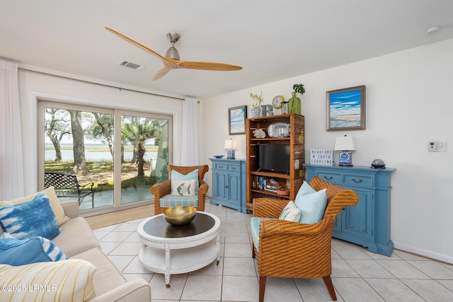 4 Marsh Harbor Dr Unit D, Beaufort, SC 29907 - living room with ceiling fan, light tile patterned flooring, and baseboards