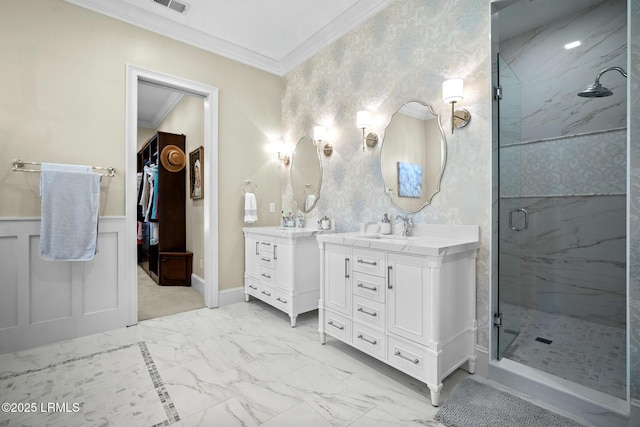 bathroom with crown molding, vanity, and walk in shower