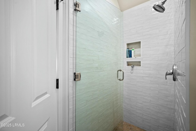 bathroom featuring walk in shower