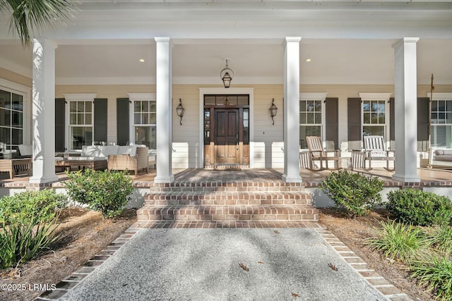 entrance to property with a porch