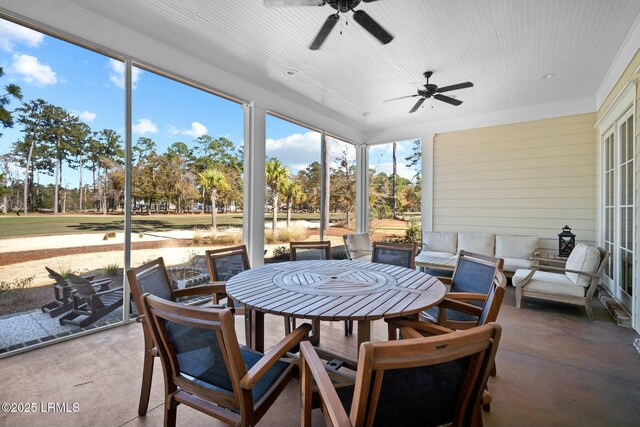 sunroom / solarium with ceiling fan